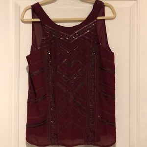 Silky and sparkly swing top for date night!